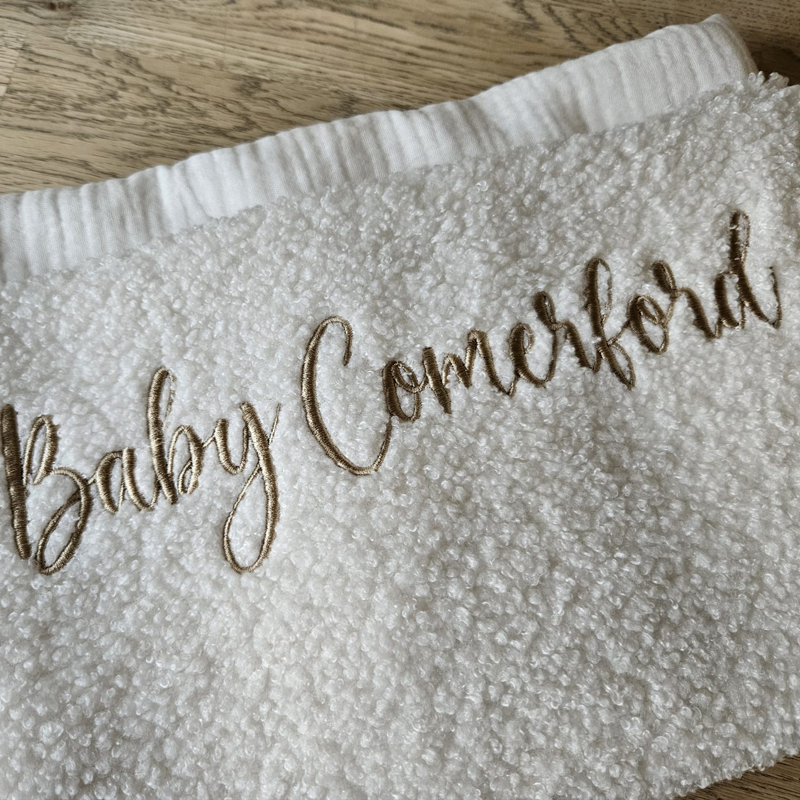 
                      
                        Cosy Pearl White Bouclé Blanket
                      
                    